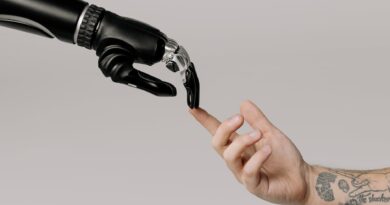 bionic hand and human hand finger pointing